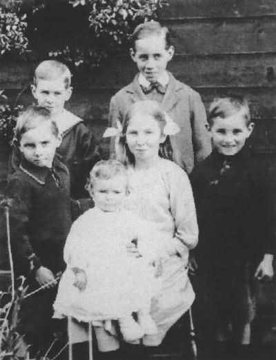 The Harman children - Doris (centre), Robert (behind), Sidney (left), Herbert and twin Bernard, and Frederick (on lap) - c 1921